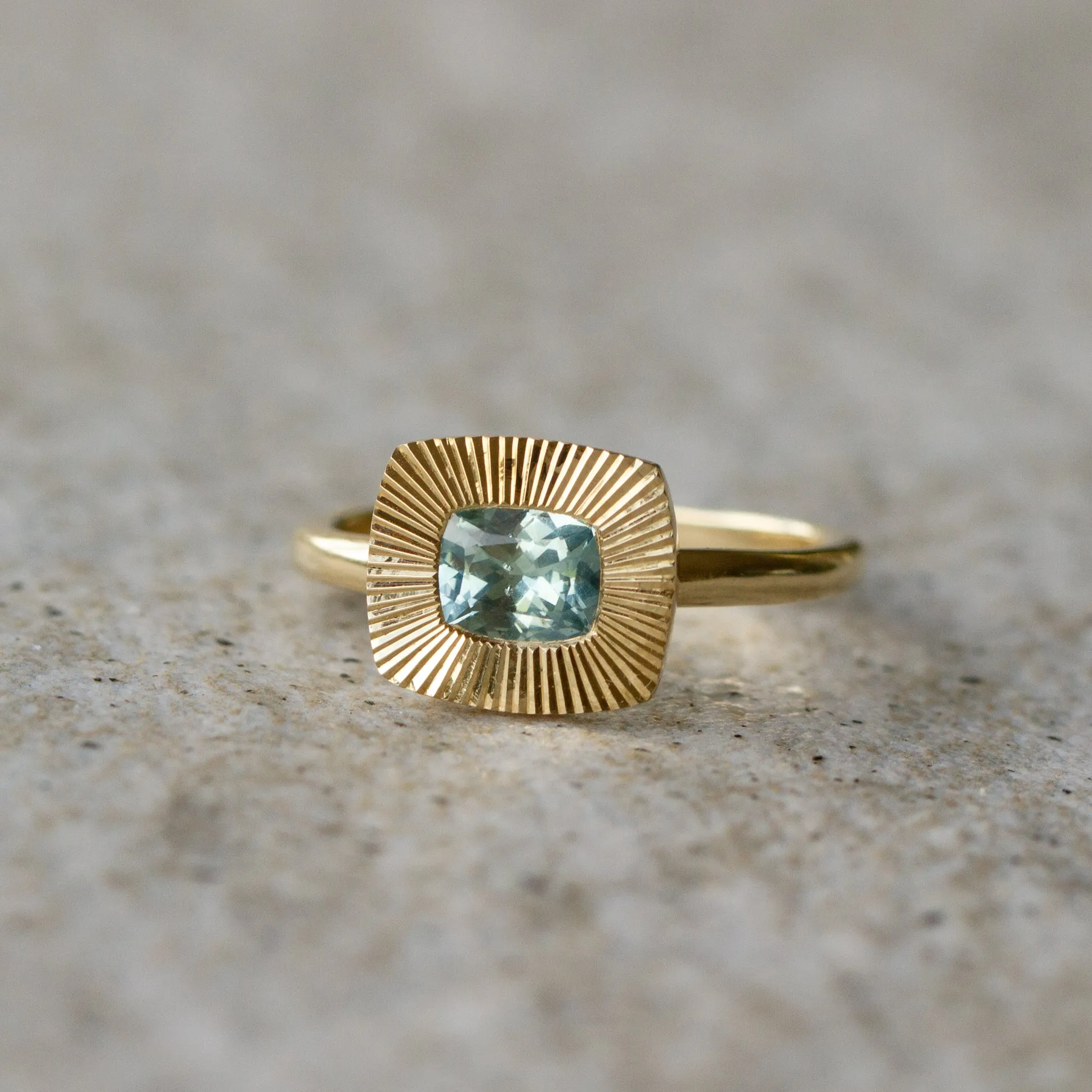 East-West Cushion Aurora Ring 14KY with Light Teal Montana Sapphire